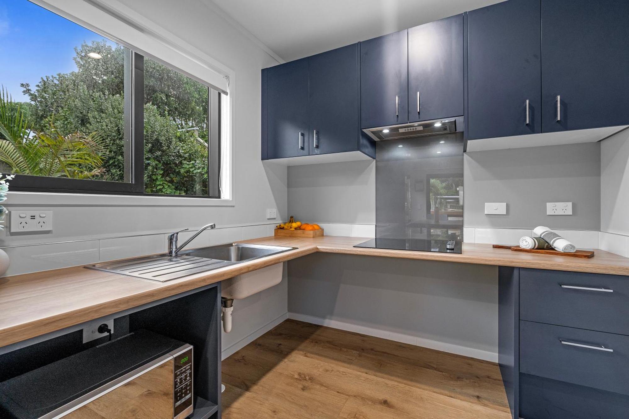 Tasman Holiday Parks - Waihi Beach Exterior foto A modern kitchen